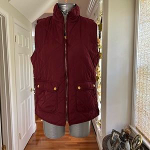 Blue Rain puffer vest. Size L, Plum . Gold zipper and buttons on front p…